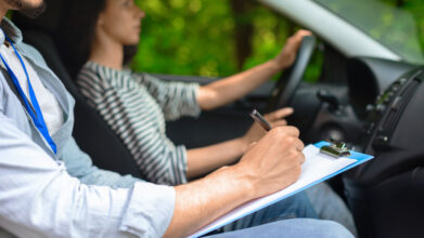 Confident new driver practicing essential driving lessons tips before road test