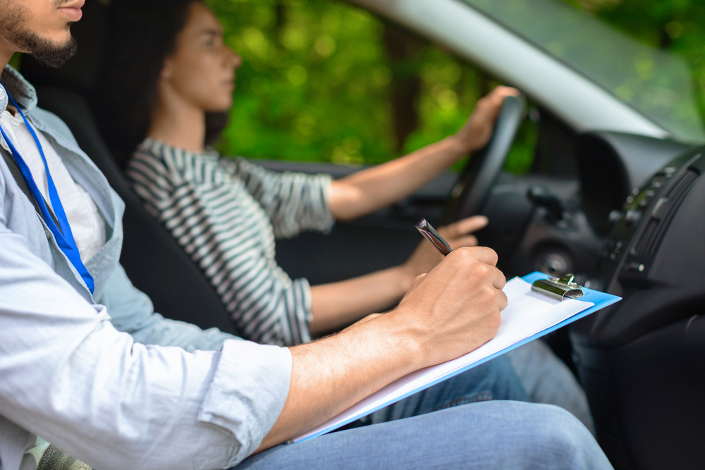 Confident new driver practicing essential driving lessons tips before road test